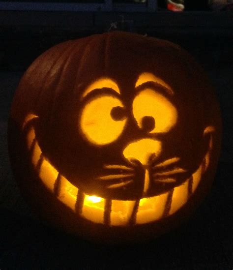 My carving of the Cheshire cat from Alice in Wonderland. I think that it actually turned out pretty well. I traced an outline of what I was going to do fir...